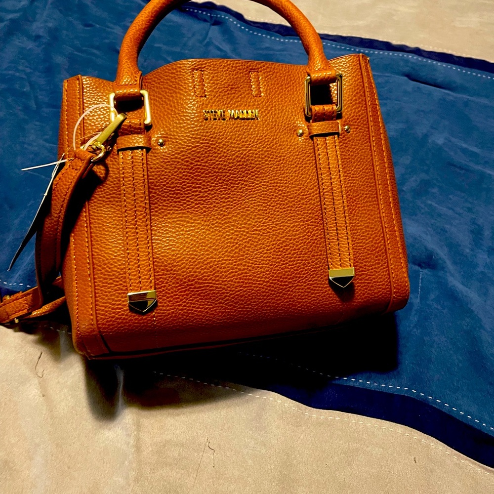 Cognac colored purse with gold accents